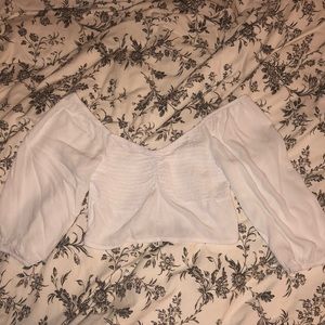 Off the shoulder white cropped shirt